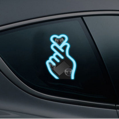 Luz LED solar para coche con forma de corazón y dedos