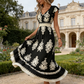 Vestido maxi fluido con estampado barroco y cuello de pico para mujer