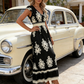 Vestido maxi fluido con estampado barroco y cuello de pico para mujer