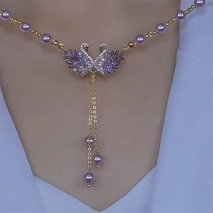 Collar con colgante de doble cisne morado